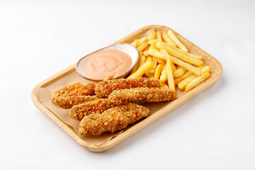 Nuggets with french fries and sauce on a white background