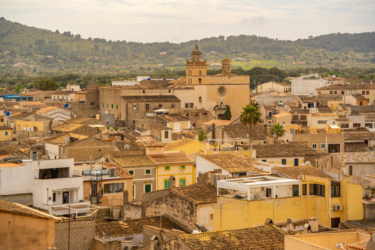 View of rooftops and narrow streets in old town Alcudia, Alcudia, Majorca, Balearic Islands