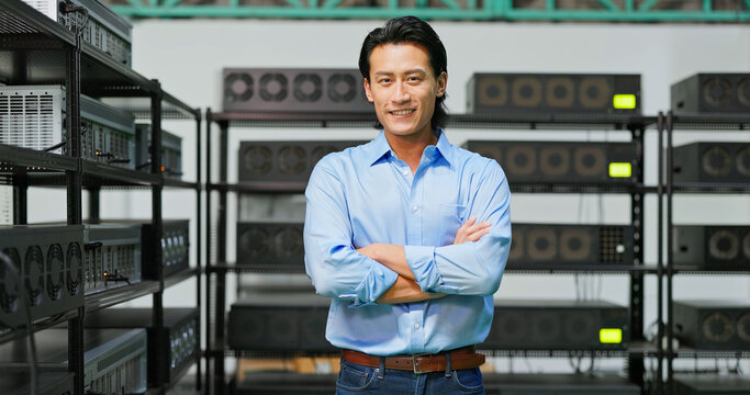 asian investor smiling at camera