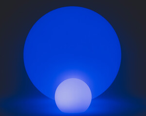Glowing and illuminated spherical coloured orbs on a black background.