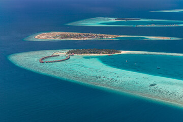 Beautiful Maldives paradise beach. Tropical aerial landscape, seascape with water villas bungalows on amazing sea lagoon beach, tropical nature. Exotic tourism destination, luxury summer vacation