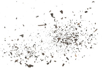 Explosion effect, burned, charred paper scraps, scattered isolated on white texture, top view