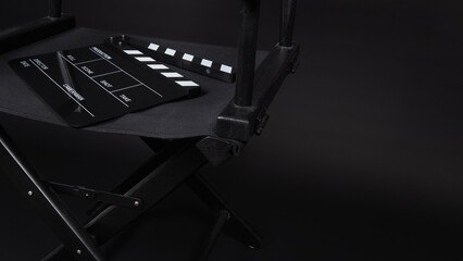 Clapperboard or clap board or movie slate with director chair use in video production ,film, cinema...