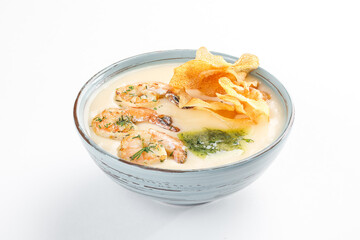 cream soup with shrimp isolated on white