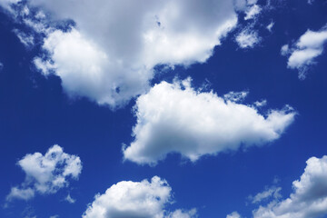 Blue sky with small cumulus clouds