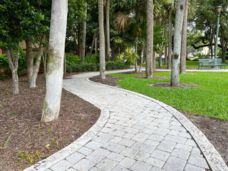 A paved pathway in a little pocket park in Ft. Lauderdale Florida.