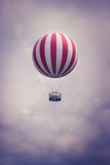 Hot Air Balloon Beyond The Stormy Clouds - 512071863
