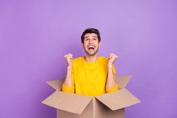 Photo of cheerful overjoyed man raise fists in victory finally buy his own home relocation isolated...