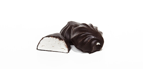 Close-up shot of whole marshmallows and one half covered with chocolate isolated on white background. Yummy mini dessert, closeup