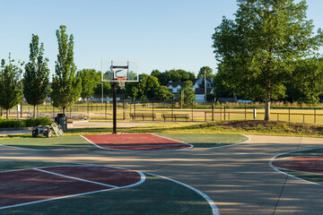 several open basketball courts on a sunny morning