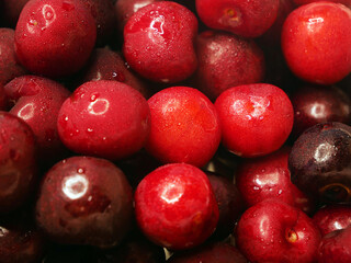 heap of fresh tasty cherries background, top view