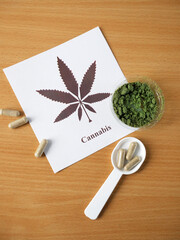 CBD Hemp pills and extract. Cannabis drugs, marijuana buds and dry grass. Cannabis pills containers with CBD. Alternative Medicine