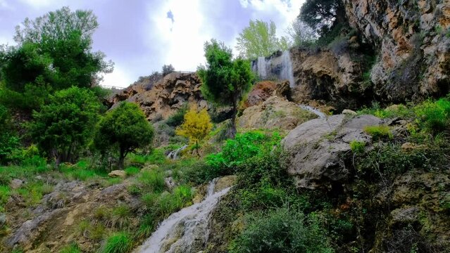 Beautiful nature with a waterfall. Idyllic landscape.