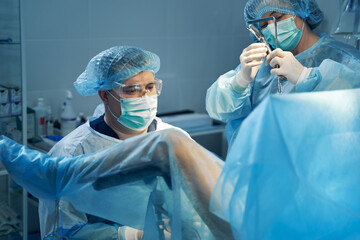 Gynecological medical treatment performed by two doctors