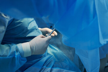 Gynecological tool in hands of medical worker