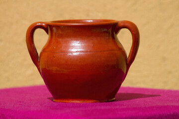 Traditional ceramic clay pot with two handles