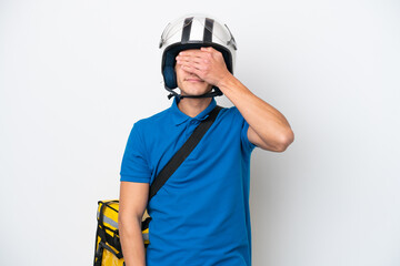 Young caucasian man with thermal backpack isolated on white background covering eyes by hands. Do not want to see something