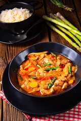 colorful turkey fricassee with asparagus and paprika