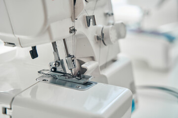 Sewing machine during working process in atelier