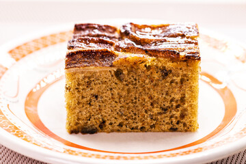 large slice of homemade vegan banana cake, healthy dessert