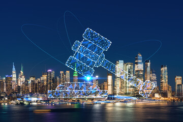 New York City skyline from New Jersey over the Hudson River with Hudson Yards at night. Manhattan, Midtown. Glowing hologram legal icons. The concept of law, order, regulations and digital justice