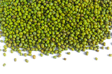 Green uncooked mung beans isolated on white background. Vegetarian healthy organic food diet. Raw green grains.