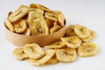 delicious dried banana on a white acrylic background