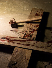 Blood drips on a wooden cross