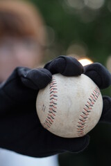 baseball and black glove
