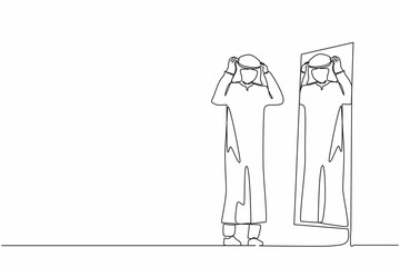 Single one line drawing Arab businessman adjusting turban in front of mirror. Man checking his appearance in mirror. Male manager looking himself in mirror. Continuous line draw design graphic vector