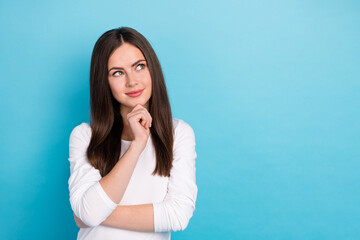 Photo of cute dreamy lovely dreamy lady look blank space brainstorming isolated on blue color...