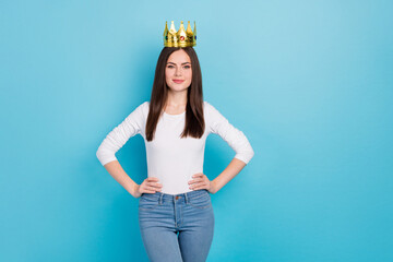 Photo of young ideal good looking positive lady with golden royal diadem take part in beauty contest isolated on blue color background © deagreez