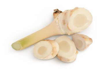 Fresh galangal root with slices isolated on white background with full depth of field. Top view. Flat lay