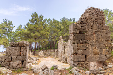 Fototapeta na wymiar Ruins of Phaselis an ancient city ranged on a peninsula surrounded by three small, perfect bays near Kemer in Turkey.