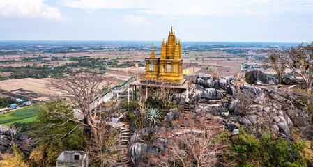 Fototapeta premium Santi Chedi and the statue of Christ the Redeemer in heaven hills in Pak Tho District, Ratchaburi, Thailand