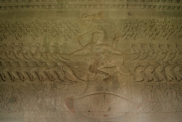 The low relief sandstone carvings tell the story of Hindu Brahmin beliefs between angels and devils...