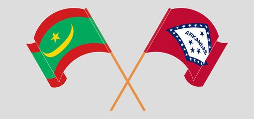 Crossed and waving flags of Mauritania and The State of Arkansas