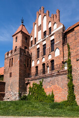 Fototapeta na wymiar View of the Gothic brick defensive walls in the historic city center of Torun