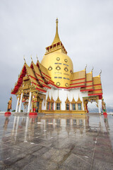 Fototapeta premium Chachoengsao Province,Thailand on June9,2018:Beautiful golden pagoda of Wat Prong Arkad in Amphoe Bang Nam Priao