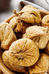 delicious dried figs on a wooden rustic background