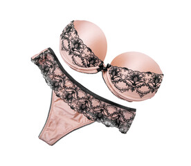 Sexy lingerie on a white background. Beautiful beige color and black lace.