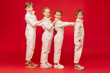 children in stylish overalls