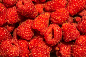 Close up fresh raspberries on the table