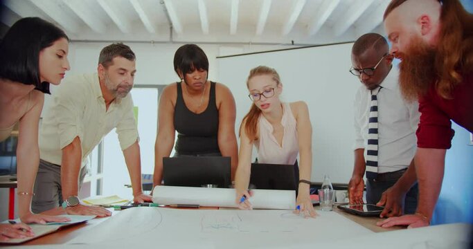 Looking at the plan while having a conversation abou it