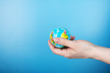 Global environmental protection earth concept, ecology development, renewable, sustainable resources, hand with globe