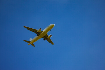 airplane in the blue sky