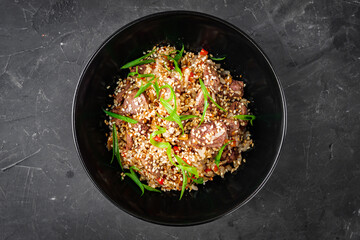 traditional chinese fried rice on black background