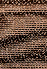 Close up of stacked brown corrugated cardboard texture
