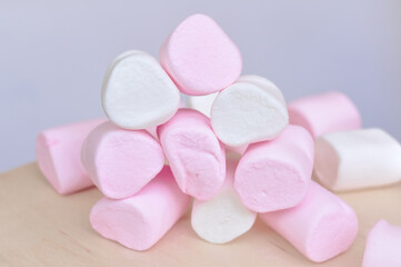 Obraz na płótnie Canvas Close up of pink and white fluffy marshmallows sweet candy for tea and coffee break . High quality photo