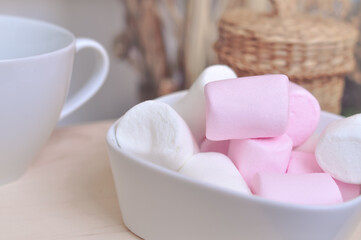 Close up of pink and white fluffy marshmallows sweet candy for tea and coffee break . High quality photo
